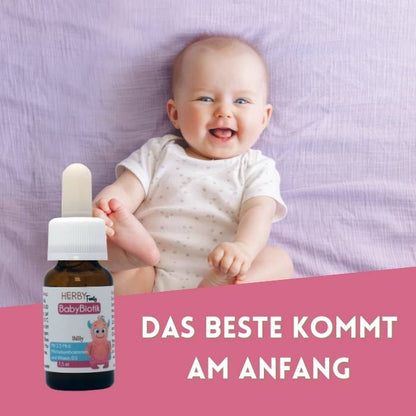 BabyBiotik Tropfen vor fröhlichem Baby